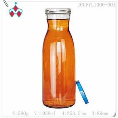 Botella de jugo de naranja de vidrio